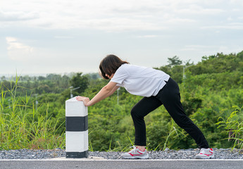 Woman preparing for jogging outdoor