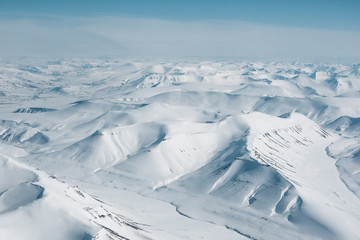 snow covered summits in an arctic mountain range