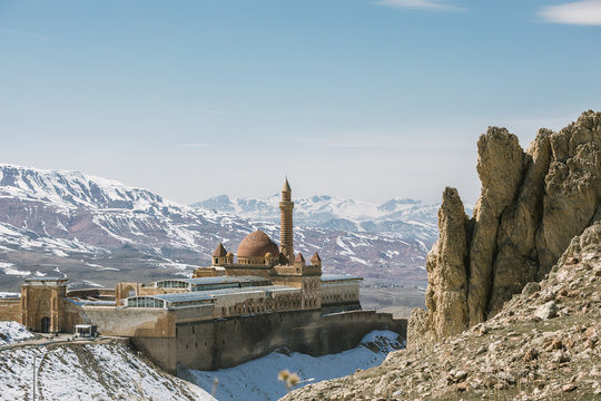 ishak pasha palace in snowcovered mountain landscape, dogubayazit, turkey