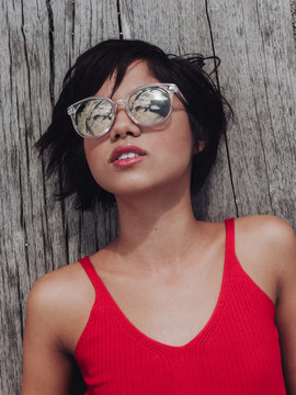 Girl wearing sunglasses standing outdoors