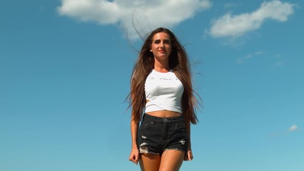 Wind blowing through a woman's face