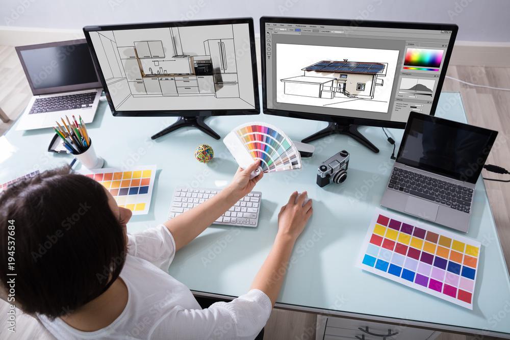 Poster designer working on color selection for kitchen and house