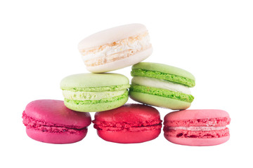 cakes of different colors lie pyramid isolated on white background