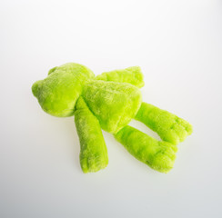 toy or frog soft toy on the background.