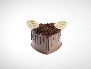 cake or love shaped chocolate cake on a background.