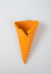 Ice cream cone or empty ice cream cone on background.