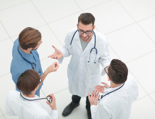 view from the top.a group of doctors discussing ideas