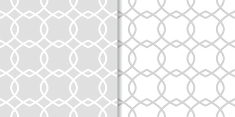 Naklejka premium Light gray geometric ornaments. Set of seamless patterns