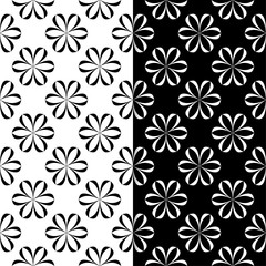 Fototapeta na wymiar Black and white floral seamless patterns. Set of backgrounds