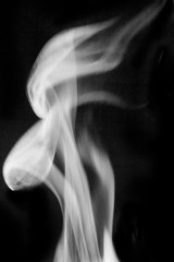smoke from  fire on a black background, for imposing on images, for artists and designers_