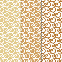 Abstract seamless patterns. Orange and white backgrounds for textile and fabrics