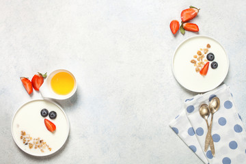 Healthy breakfast - yogurt with muesli and berries.