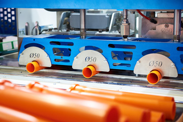 Machine for production of plastic pipes
