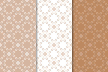 Brown floral ornaments. Set of vertical seamless patterns