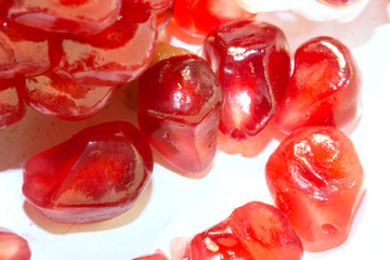 macro photography of pomegranate seeds