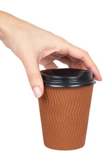 Take out coffee in thermo cup with hand. Isolated on a white background. Disposable container, hot beverage