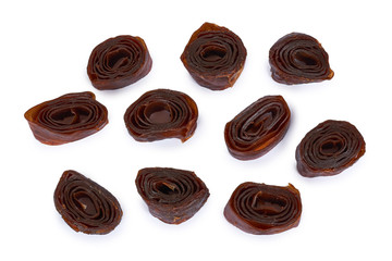 Home made apple and plum fruit pastille rolls. Isolated on white background. Healthy kids food and snack, natural ingredients