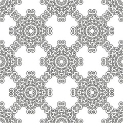 Stylized monochrome floral pattern of spirals. Black and white seamless geometric pattern