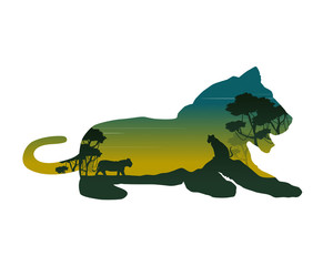 Silhouette of lioness on the hill landscape