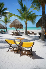 Long chairs on the beach, Caribbean island