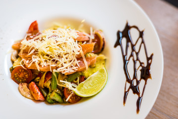 Italian pasta with salomon served on the plate