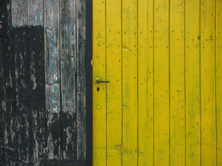 Old yellow wooden door