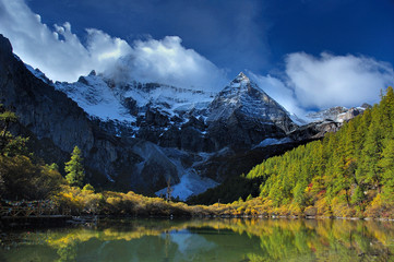 Naklejka na ściany i meble Swiss mountain landscape with lake.