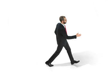 Full body portrait of businessman with folder on white