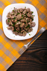 boiled broad beans on a rustic background