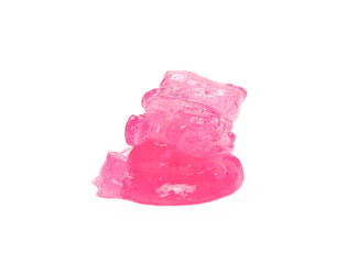 Pink modelling, plastic clay lump isolated on white background