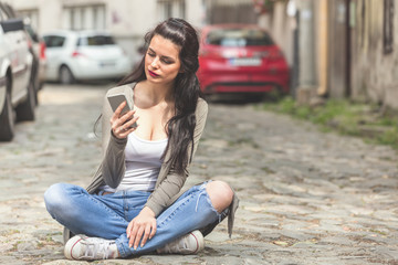 Cute urban girl talking on the phone.