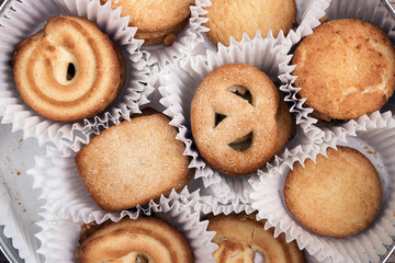 Set of traditional Danish butter cookies from Denmark in paper cases.
