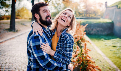Fototapeta premium Meeting in the park. Romantic couple having fun in the park. Love, dating, romance