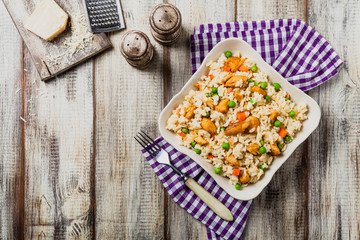 Delicious risotto with chicken and green peas.