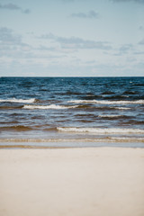 Sea with beach and blue sky. Latvia