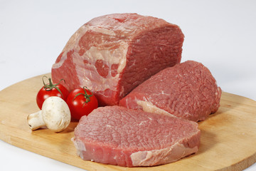 Fresh raw meat on cutting board
