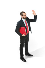 Choose me. Full body view of businessman with red folder on white studio background