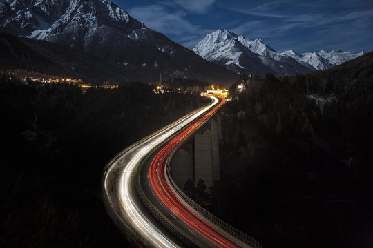 Europe Bridge at night, behind mountains Serles, Elfer and Habicht, Stubai Glacier, Stubai Alps, Brenner Motorway, Wipptal, Tyrol, Austria, Europe