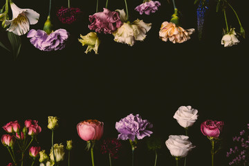 collection of beautiful tender fresh blooming flowers isolated on black