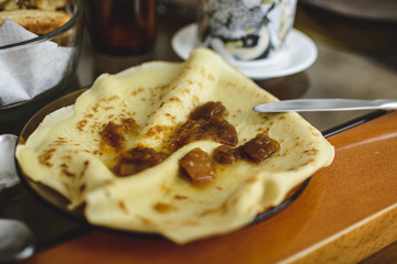 pancakes with home made jam in a plate.