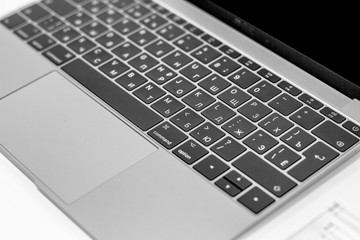 Laptop keyboard, buttons.