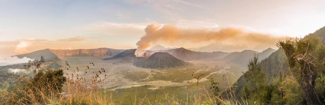 Sunrise, smoking volcano, Gunung Bromo, Mount Batok, Mount Kursi, Mount Semeru, Bromo Tengger Semeru National Park, Java, Indonesia, Asia