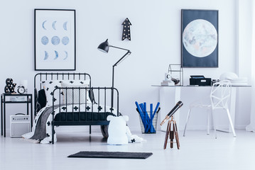 Lunar posters in child's bedroom