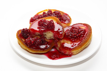 Pancakes with raspberry jam.