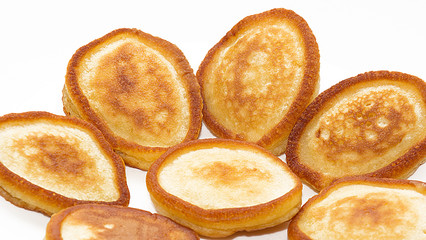 Homemade fritters on a white background.