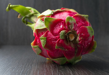 dragon fruit on the black table