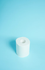 Daily necessities, Toilet paper. copy space, light blue background.　日用品　トイレットペーパー　余白あり　水色背景