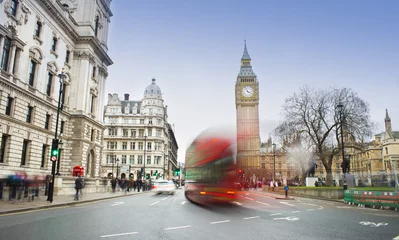 Fototapeten London city scene with red bus and Big Ben in background. Long exposure photo © Ioan Panaite