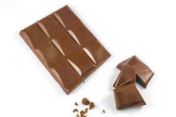 Chocolate pieces on a white background