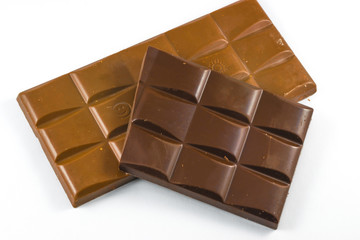 Chocolate pieces on a white background